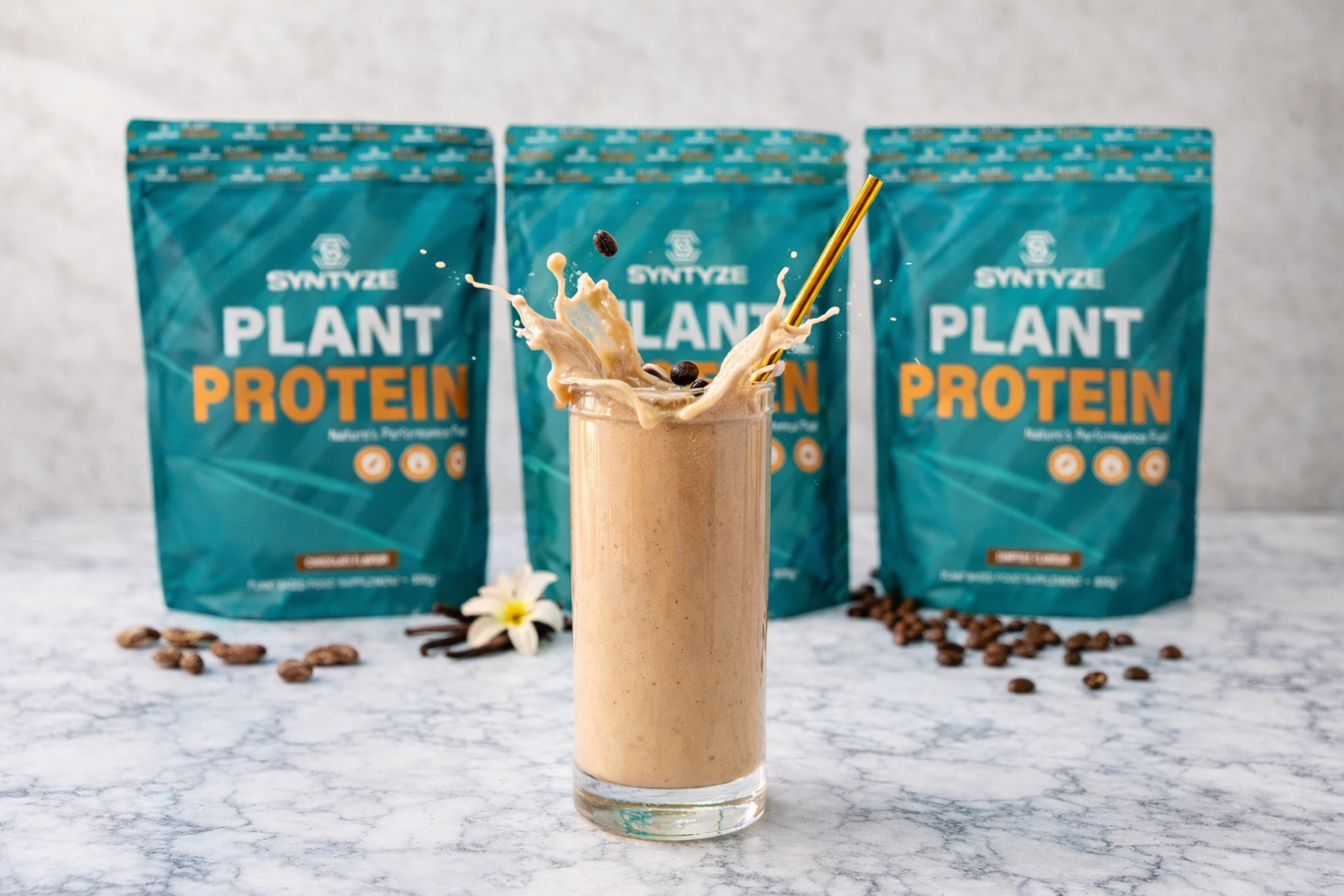 SYNTYZE Protein Shake splashing in a glass with 3 bags of protein powder blurred out in the background